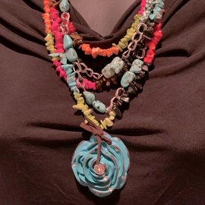 Ceramic hand fashioned bead necklace with flower pendant